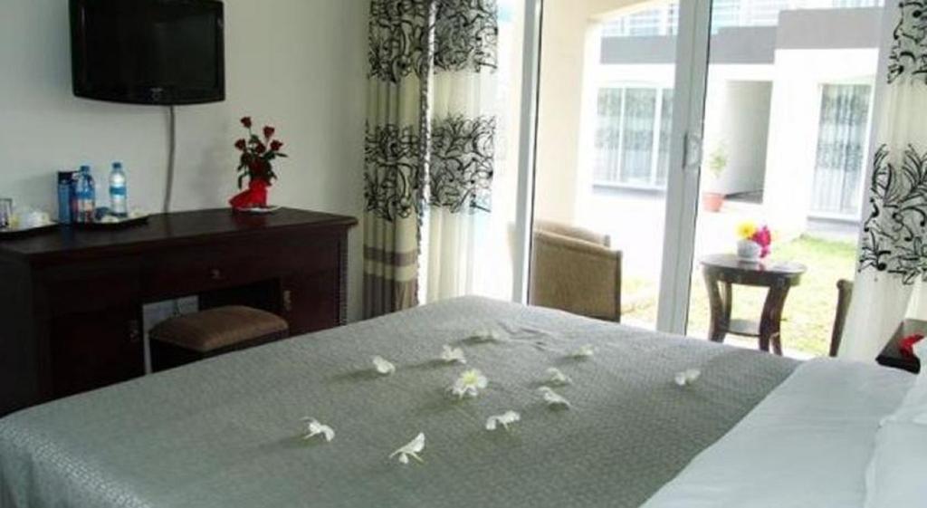 Mo Residence Pereybere Beach Bagian luar foto